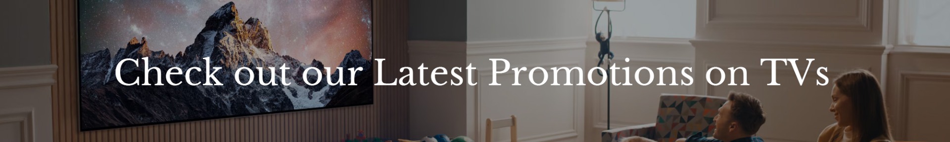 A family watches a large TV in a cozy living room. Text overlay reads, "Check out our Latest Promotions on TVs." Warm lighting creates a welcoming atmosphere.