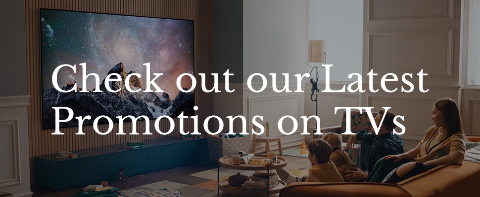 A family watches a large TV in a cozy living room. Text overlay reads, "Check out our Latest Promotions on TVs." Warm lighting creates a welcoming atmosphere.
