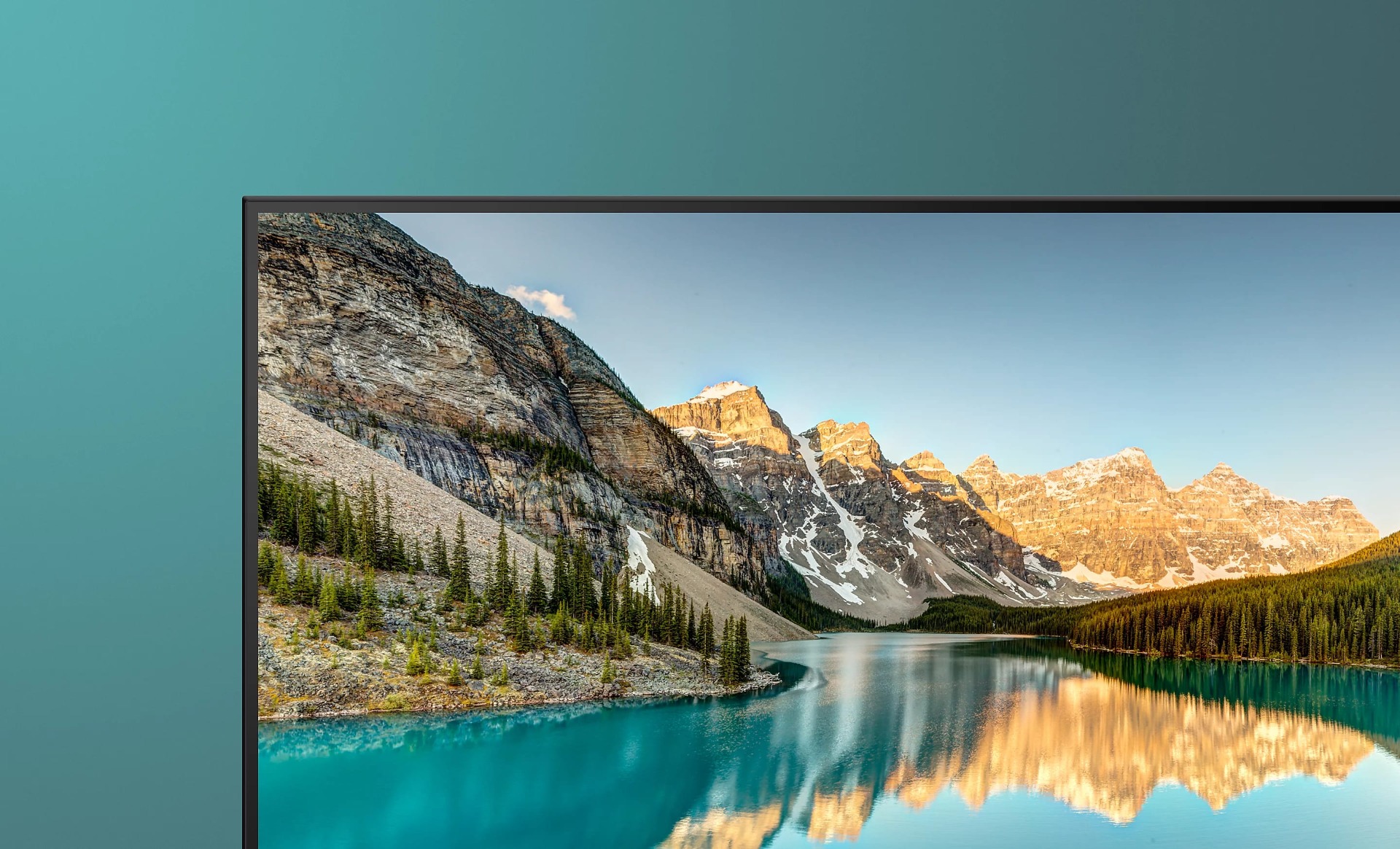 Image showing top part of TV with screenshot of mountains reflected in a lake.