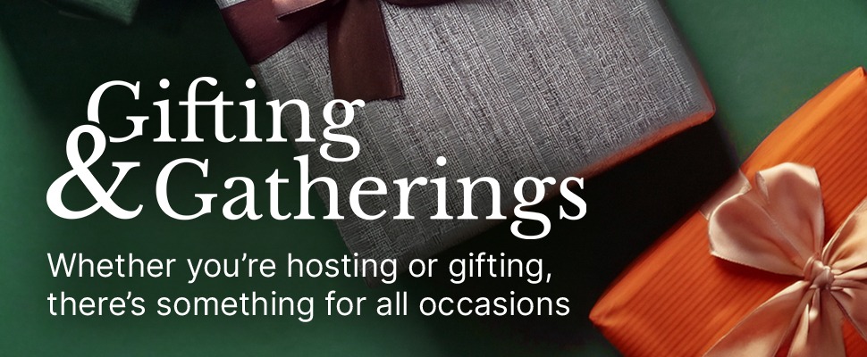 Festive scene with wrapped gifts; a green box with an orange ribbon and an orange box with a gold ribbon. Text reads 'Gifting & Gatherings.
