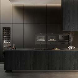 Sleek modern kitchen with dark wood cabinetry, integrated appliances, and a minimalist island. Steam rises from a kettle, creating a warm, contemporary feel.